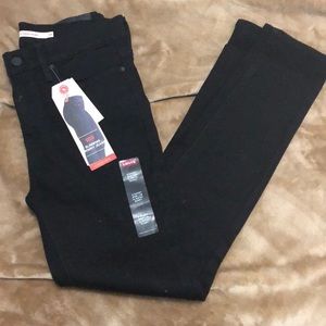 Levi “Slimming Skinny” black denim jeans; 28 short